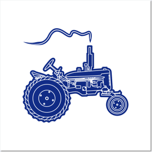 old farming machine in blue white color Posters and Art